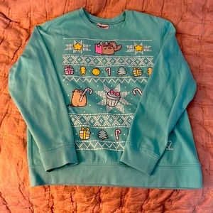 Pusheen Christmas sweatshirt.